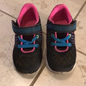 Nike sneakers in black and neon pink